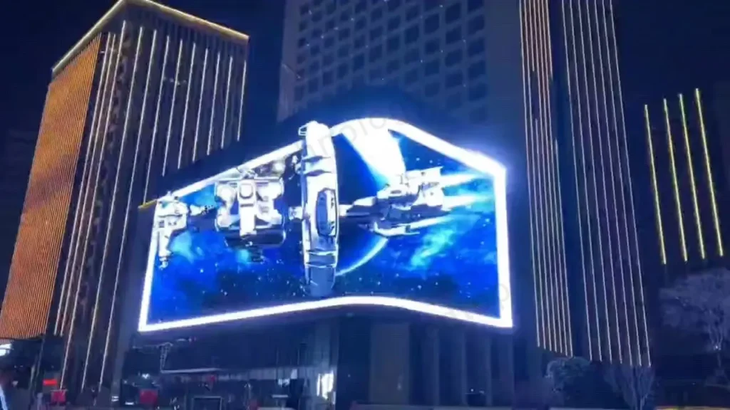 Écran géant DOOH lumineux sur un emplacement OOH de centre-ville pour campagne publicitaire extérieure.